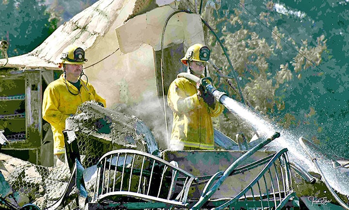 Firefighters douse hot spots at Los Rios Rancho fire